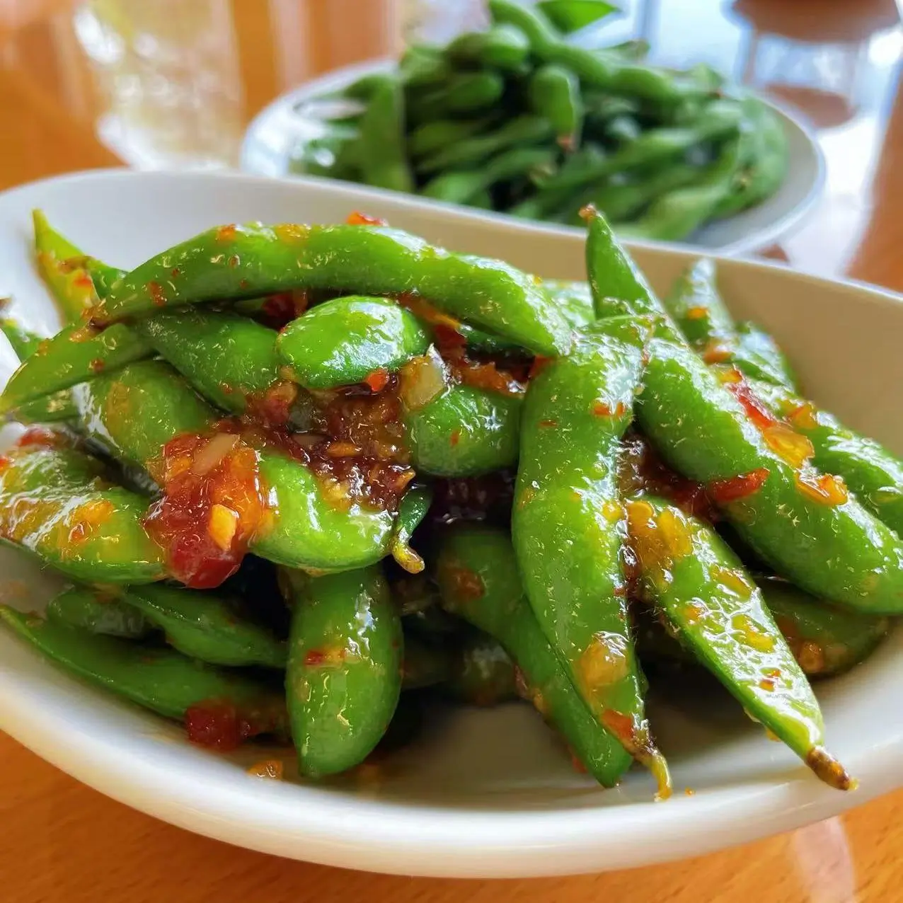 Asian-Cafe-Asian-Fusion-restaurant-Spicy-Edamame2-Fayetteville Spicy Edamame2 - Boiled edamame tossed in spicy sauce at Asian Cafe, a Asian Fusion restaurant in Fayetteville